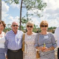 Group of five guests standing outside at Naples 2019